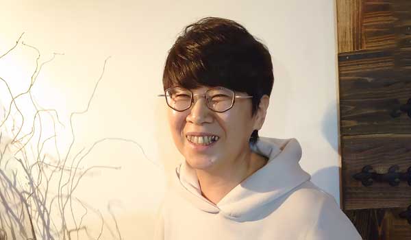 野村 久美子さん